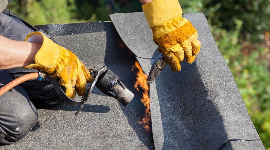 Expert tile roof repair services in What Cheer, IA